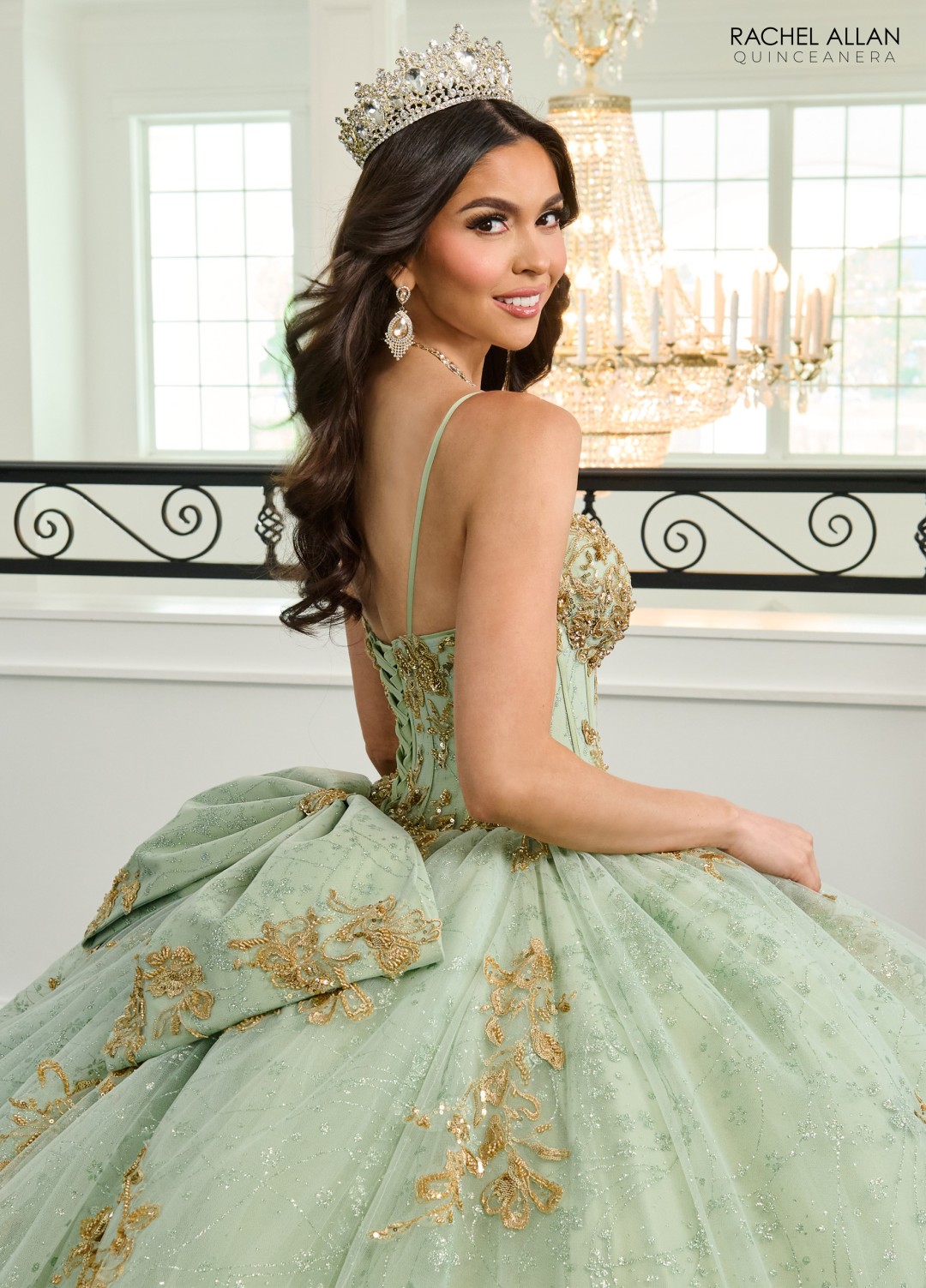 Mint green glitter quinceañera gown with gold floral embroidery
