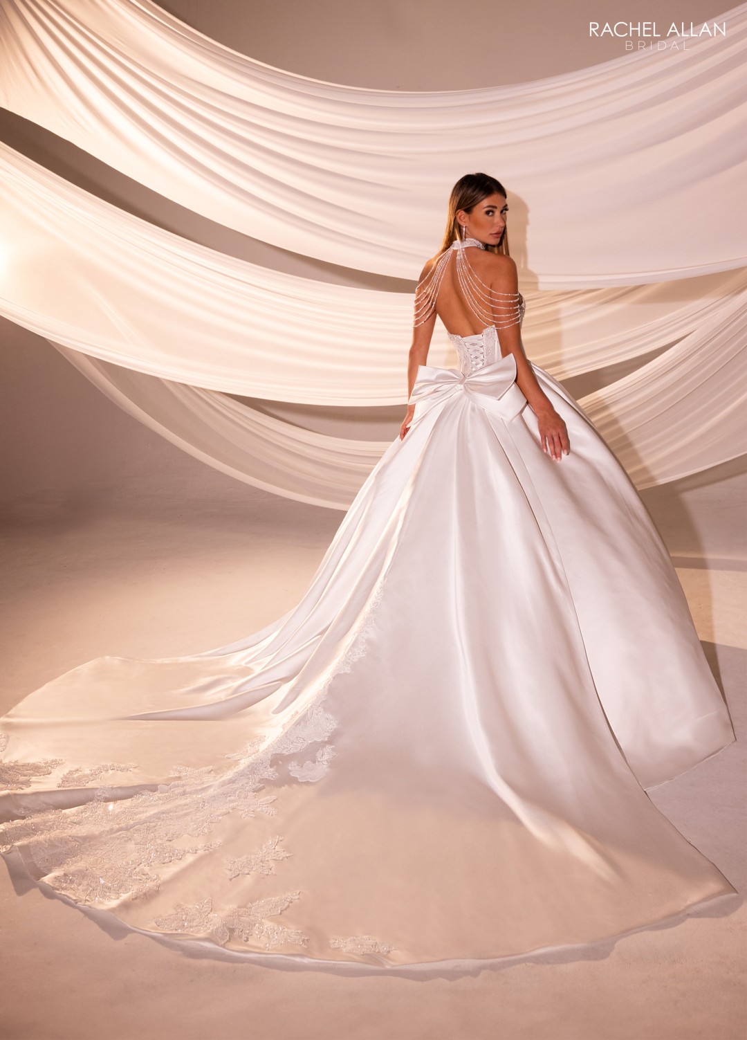 Ivory ballgown bridal dress with glitter tulle, sweetheart neckline, and fitted bodice