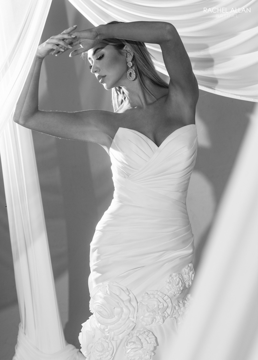 3.	Rachel Allan Style RB5109 sweetheart mermaid bridal dress with ruched satin bodice and 3D floral appliqués in ivory